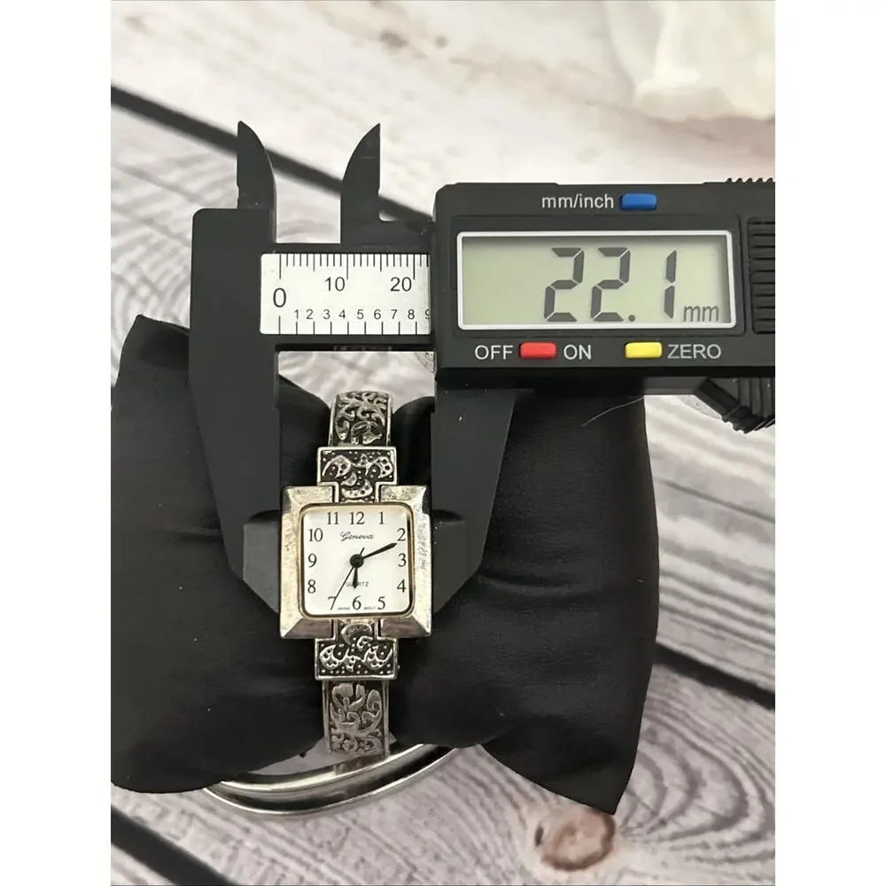 Geneva Silver Tone Women’s Quartz Cuff Watch